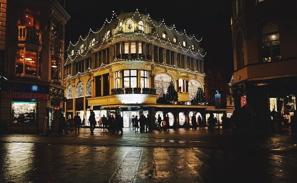 Photo of People on Road at Night