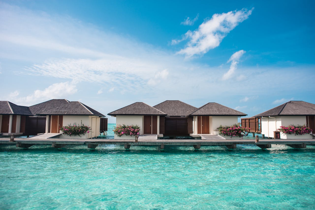home-hero Splendid overwater villas in Maldives offering a serene and luxurious vacation experience.